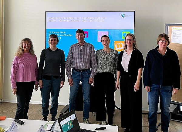 Gruppe von Menschen bei einer Besprechung